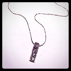 Silver necklace with pink rhinestones